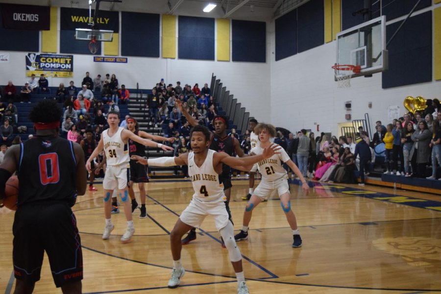 Senior Stefan Hall blocks the opposing team. The homecoming game against Everett was an intense game for both the athletes and the students.