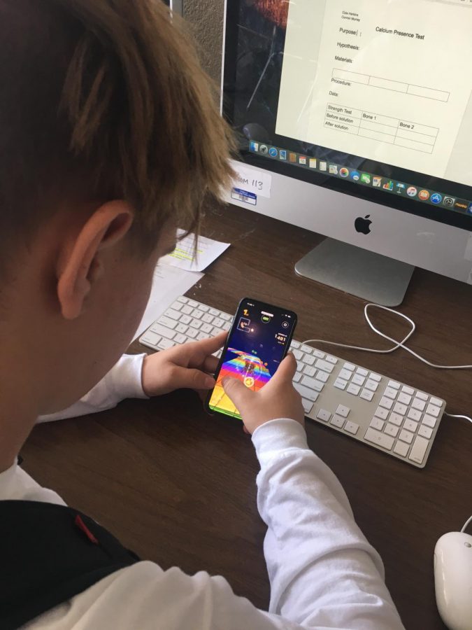  Grand Ledge High School student Cole Harkins is playing the new Mario Kart Mobile app. Cole was in first place, showing dedication to the game.
