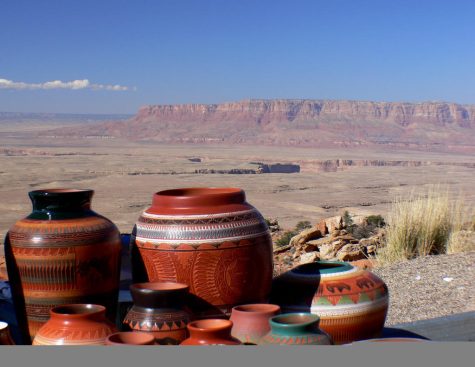 Here, Pottery is shown in a desert landscape. This, along with many other creations were done by Indigenous Peoples. 