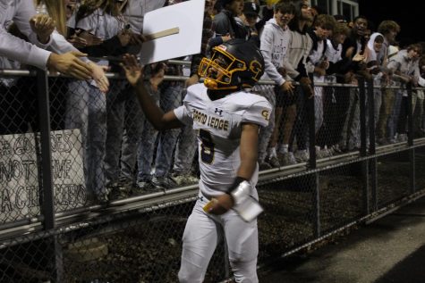 Shawn Foster runs over to the student section after the Comets big win on Friday night. The football team will play Brighton this Friday, Oct. 28th. 
