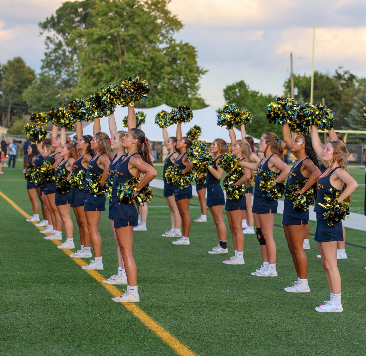 The cheerleders sing the GLHS Fight Song. All 27 of the girls stand on the sidelines.
Photo by The Ledge Yearbook Staff.