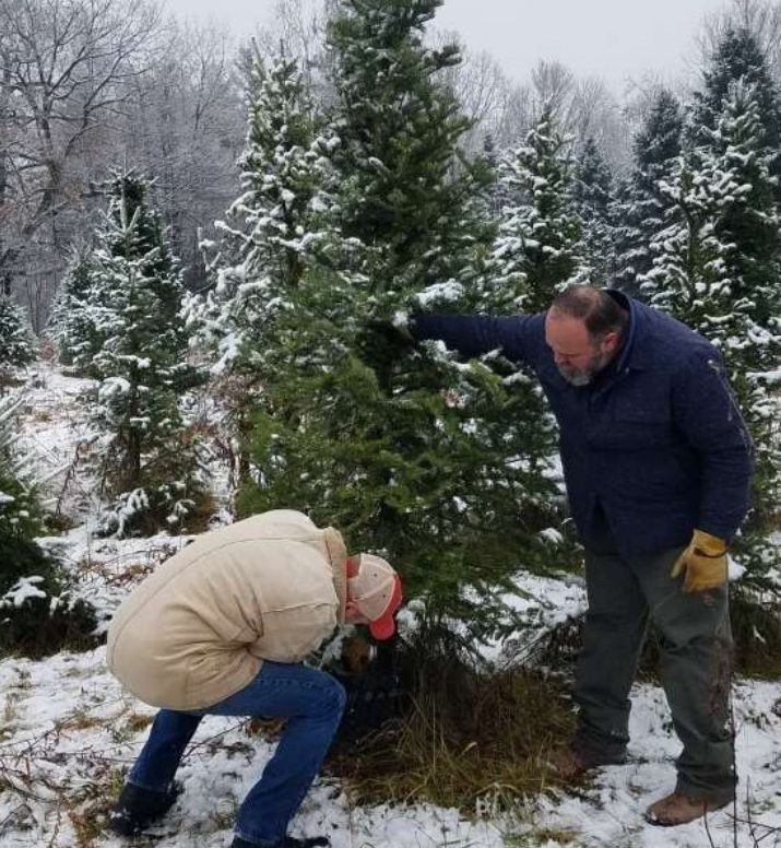 Maya Cool’s family cuts down their Christmas tree at Reverman Farms. For the past 16 years, this outing has been a special way for her family to celebrate the start to the holiday season.