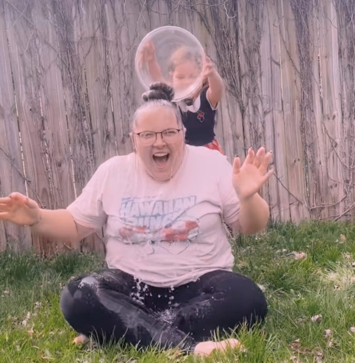 Rylee Hays screams in full-body shock after getting iced water poured onto her.