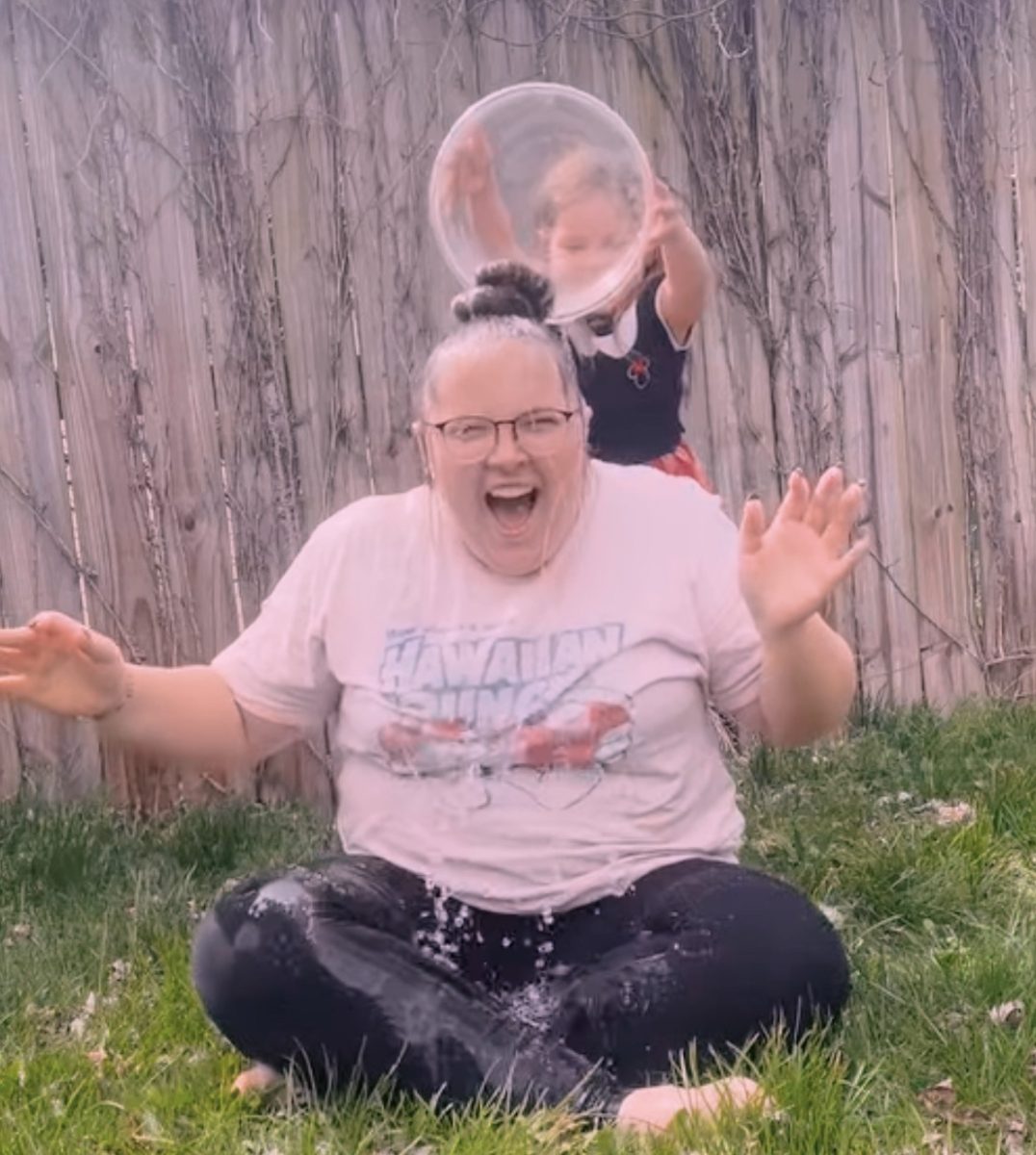 Rylee Hays screams in full-body shock after getting iced water poured onto her.